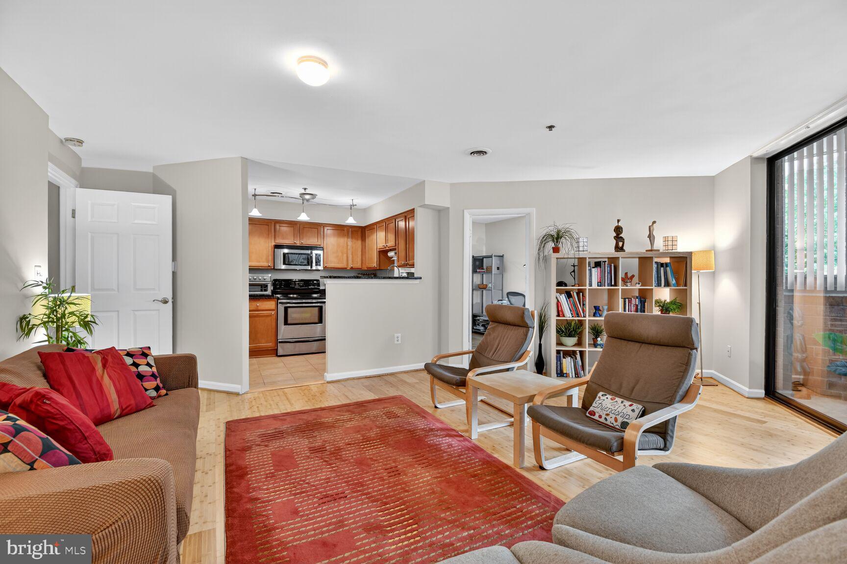 1001 North Vermont Street, Unit 102 Arlington, VA 22201 - Photo 5 of 27 a living room with furniture