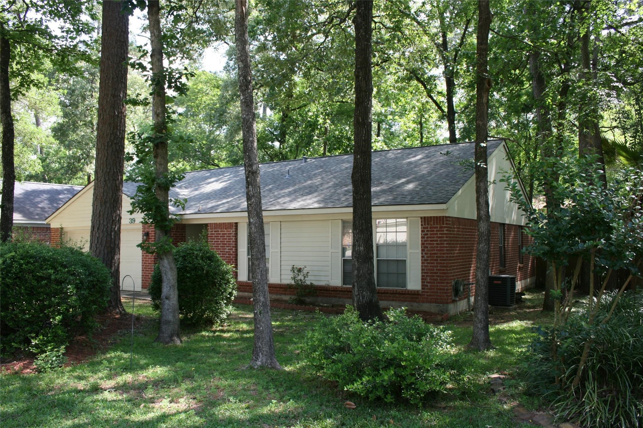 39 South White Pebble Court Spring, TX 77380 - Photo 1 of 6 a view of a back yard