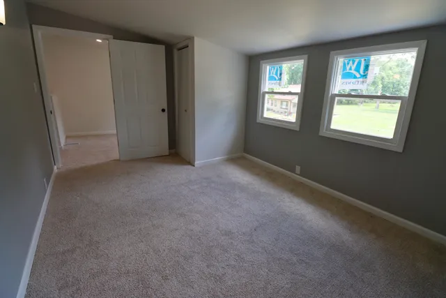 an empty room with windows