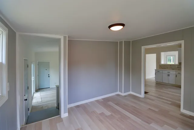 wooden floor and closet in a room