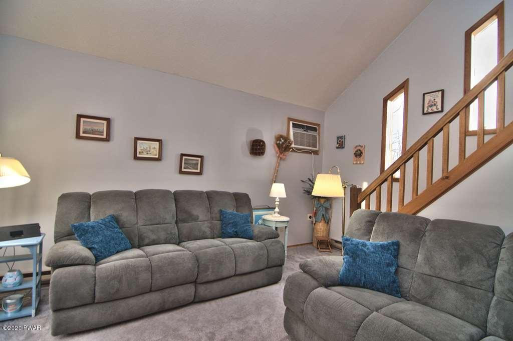 27-2690 Boulder Road Lake Ariel, PA 18436 - Photo 8 of 48 a living room with furniture and a stairs