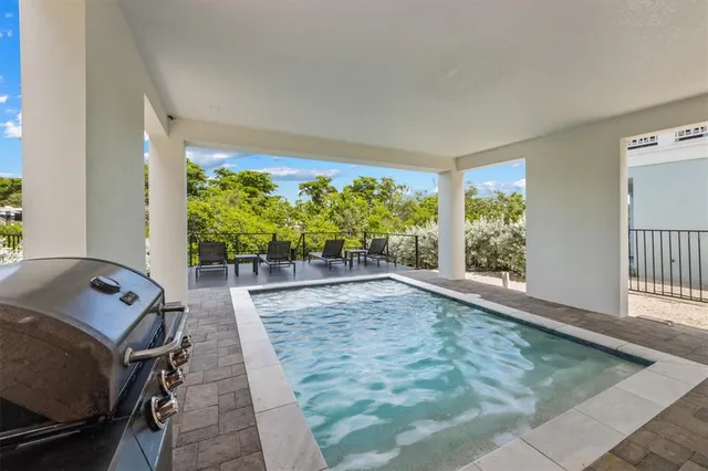 a view of a living room and dining room