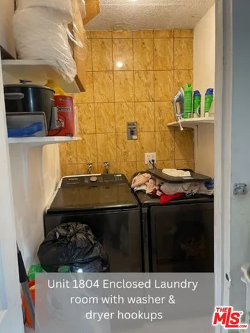 a bathroom with a stove and a shower