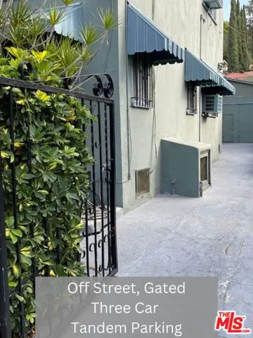 a view of a house with a plant