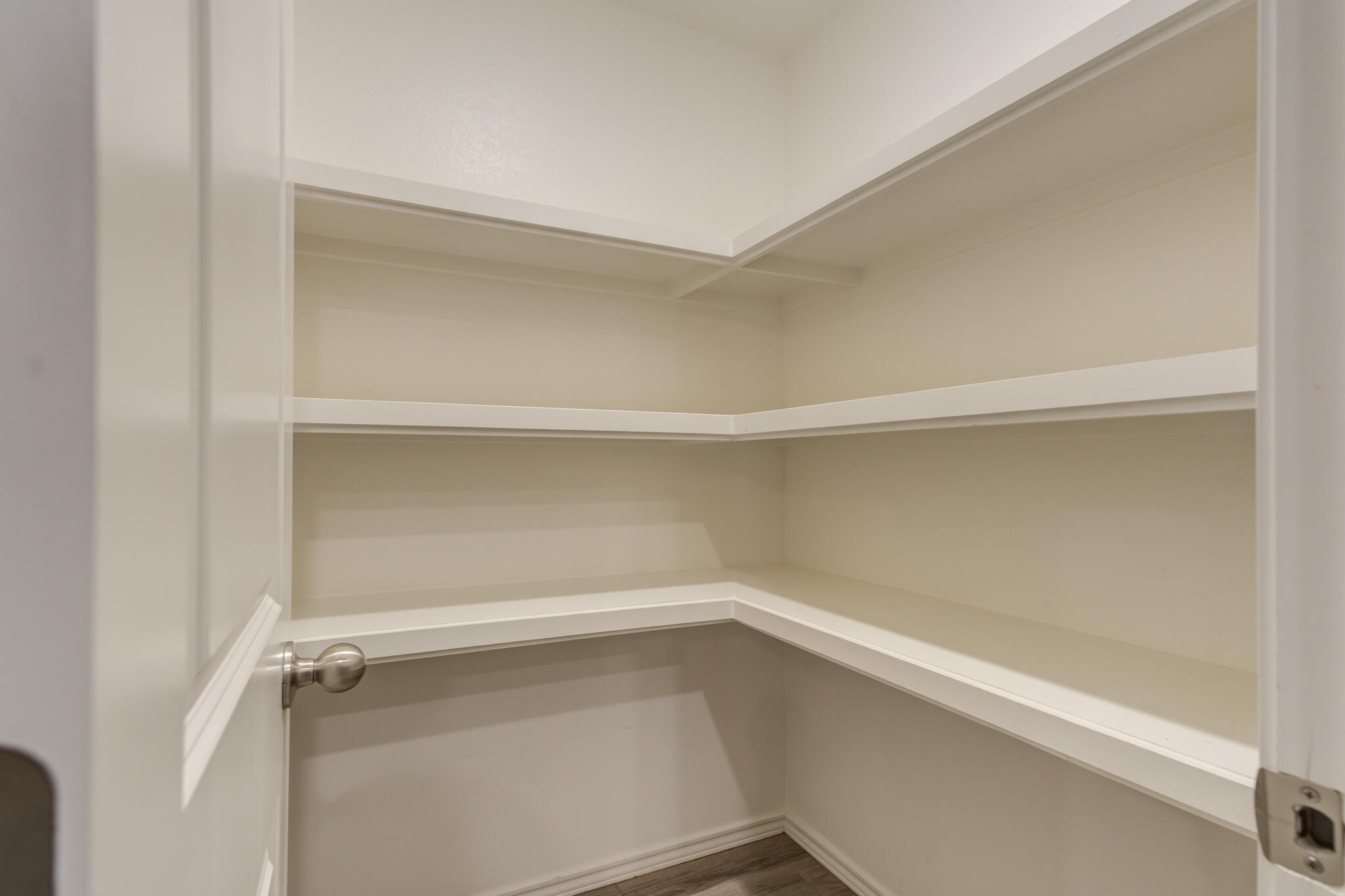 6902 67th Street Lubbock, TX 79424 - Photo 9 of 35 a view of an empty walk in closet