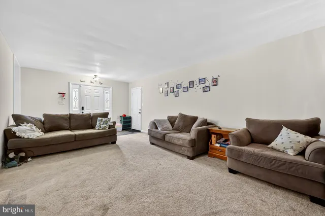 a living room with furniture and a couch