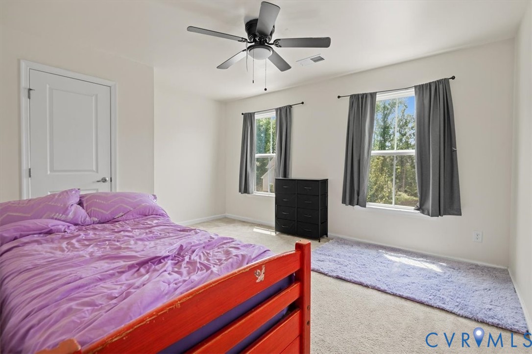 9013 Bailey Hill Road Midlothian, VA 23112 - Photo 47 of 56 Room featuring a ceiling fan with integrated light