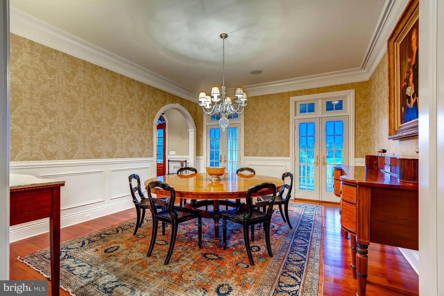 2230 Monkton Road Monkton, MD 21111 - Photo 8 of 30 a view of a dining room with furniture and chandelier