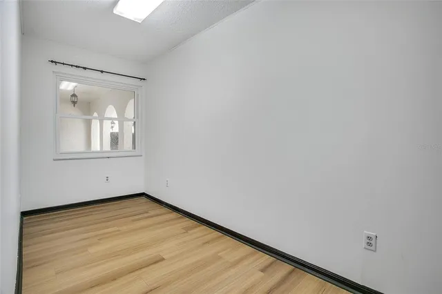 an empty room with a window