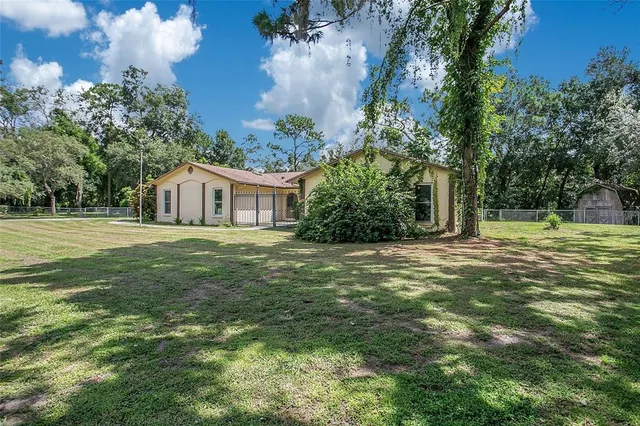 a house view with a garden space