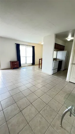 a view of a livingroom with furniture