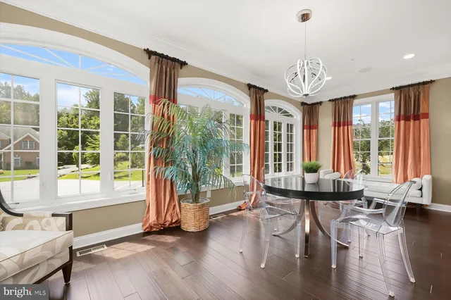 a bed room with furniture and a window