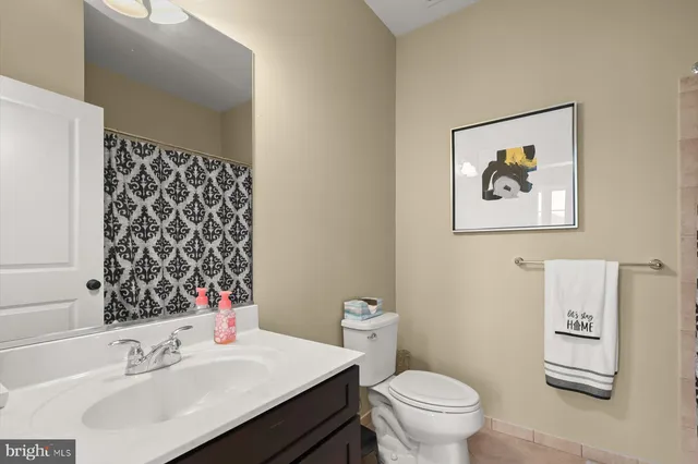 a view of a patio with a table and chairs