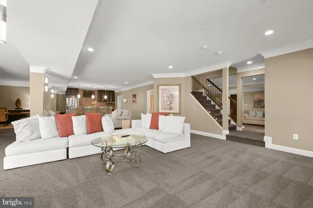 a view of a house with backyard sitting area and garden