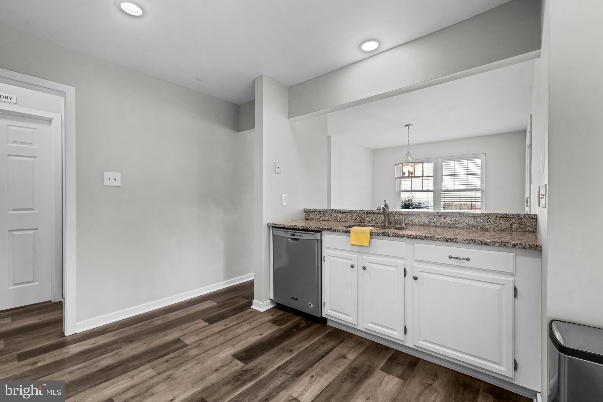12 Apple Way Marlton, NJ 08053 - Photo 13 of 47 a kitchen with granite countertop white cabinets and white appliances
