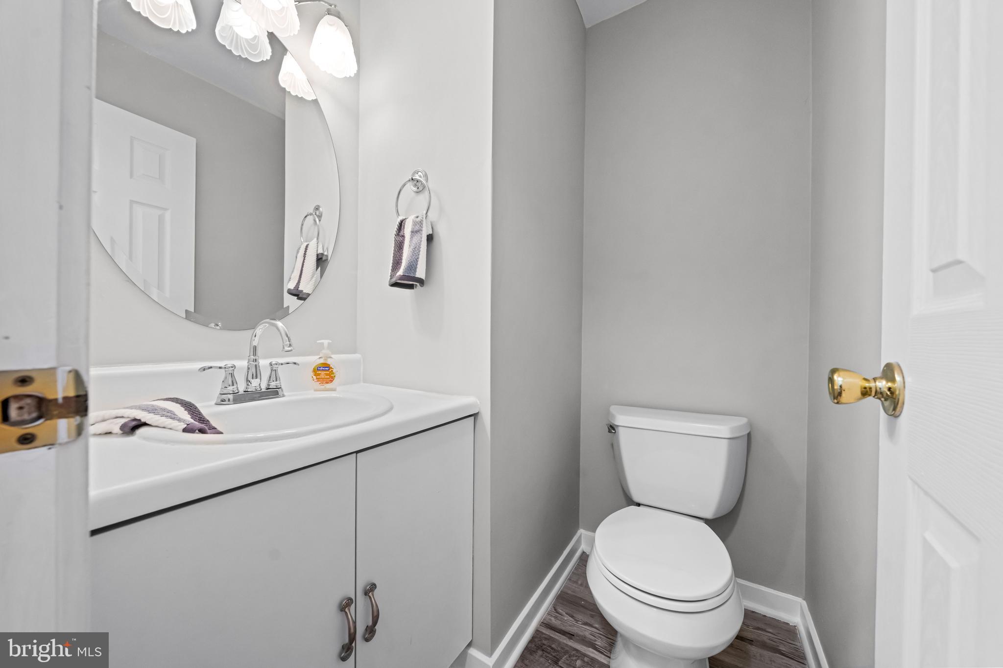 12 Apple Way Marlton, NJ 08053 - Photo 17 of 47 a bathroom with a sink mirror vanity and toilet