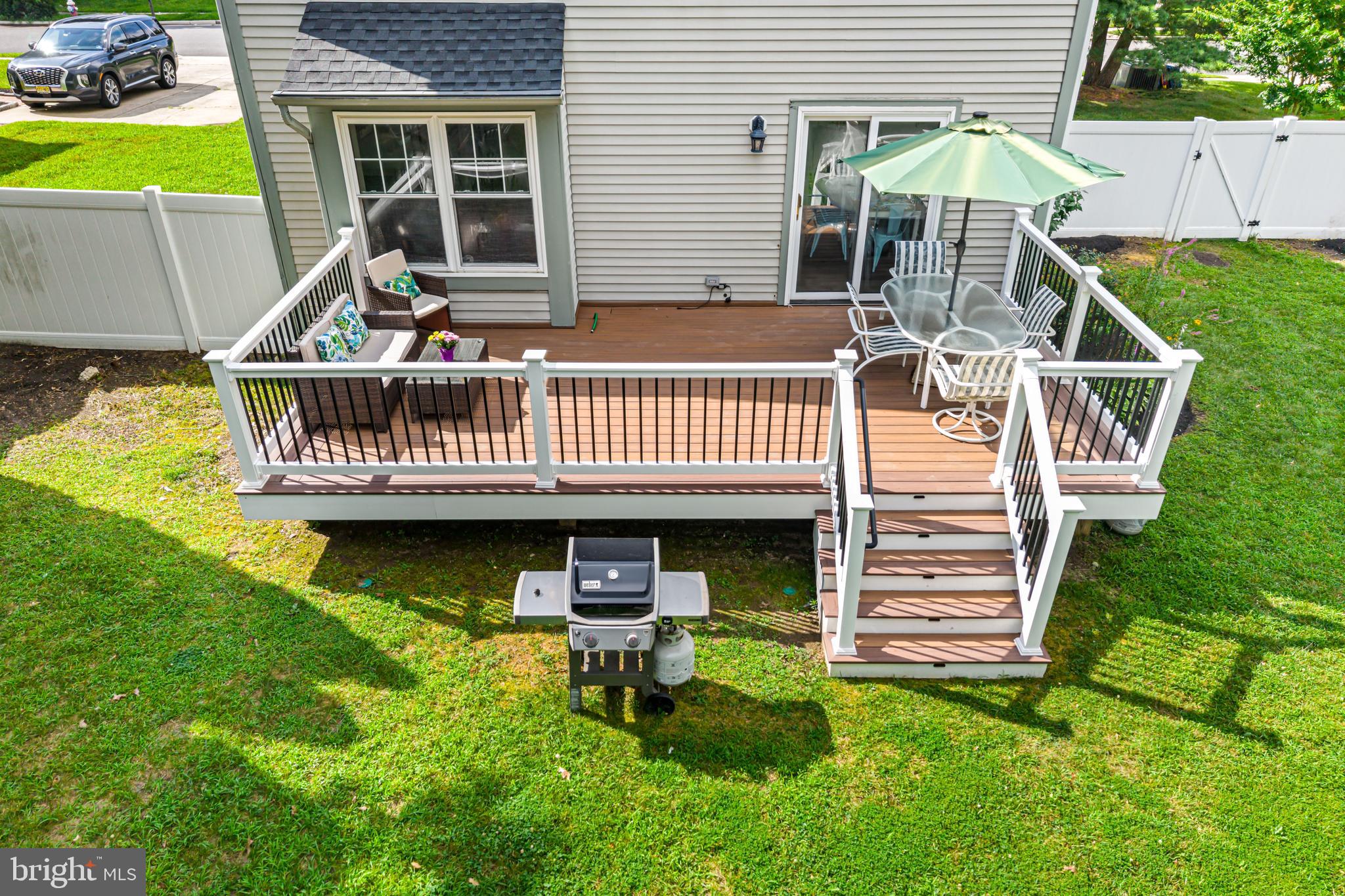12 Apple Way Marlton, NJ 08053 - Photo 36 of 47 a view of a chair and table in the patio in front of house