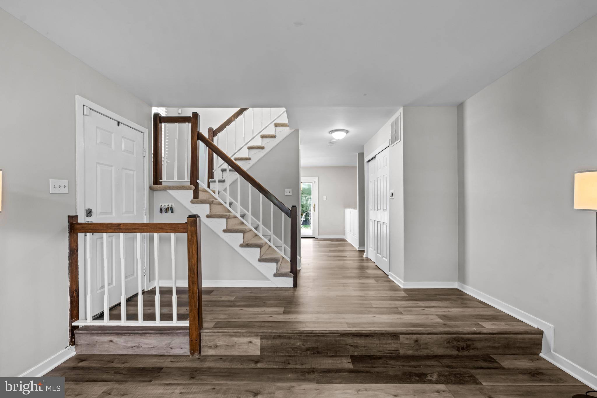 12 Apple Way Marlton, NJ 08053 - Photo 9 of 47 a view of entryway livingroom and hall with wooden floor