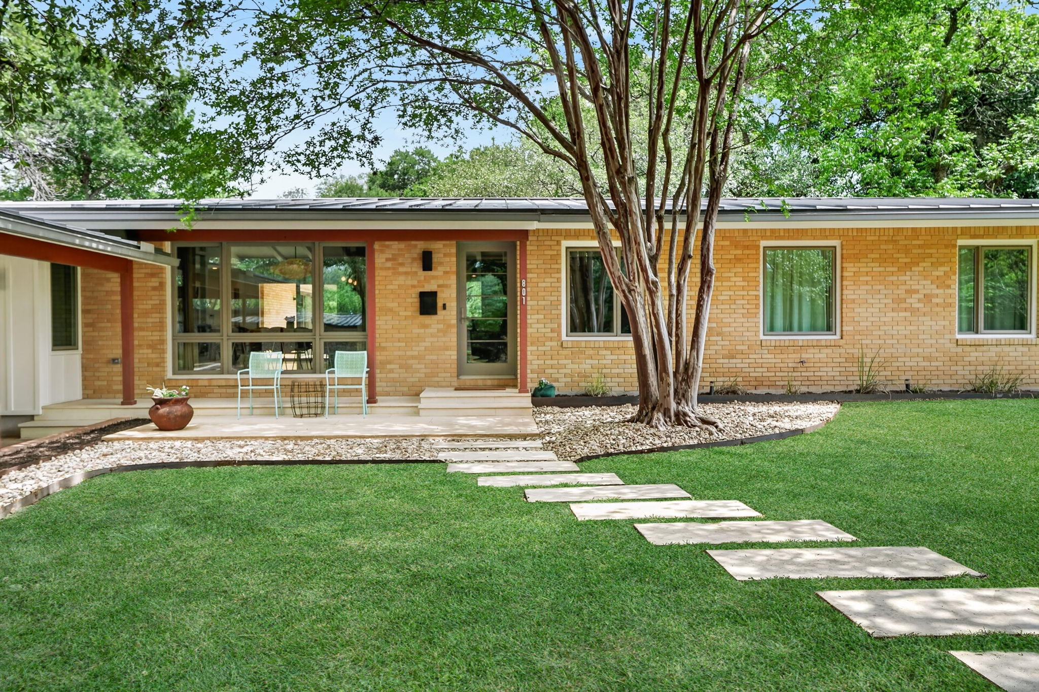 801 Spofford Street Austin, TX 78704 - Photo 1 of 1 front view of a house with a yard