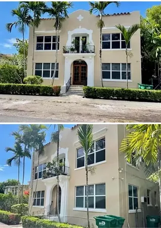 a front view of a building with a garden