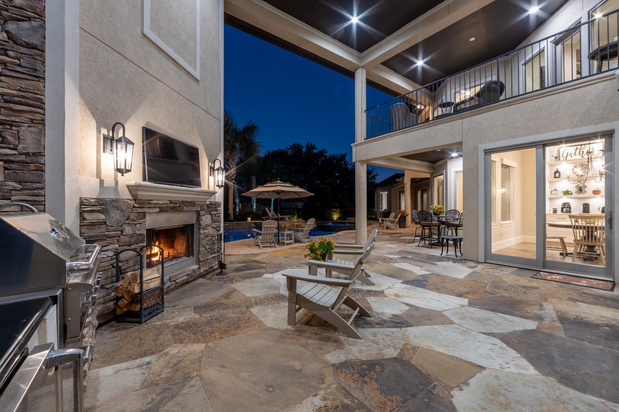 15702 Knauff Ranch Court Cypress, TX 77429 - Photo 40 of 50 a living room with furniture a fireplace and a flat screen tv