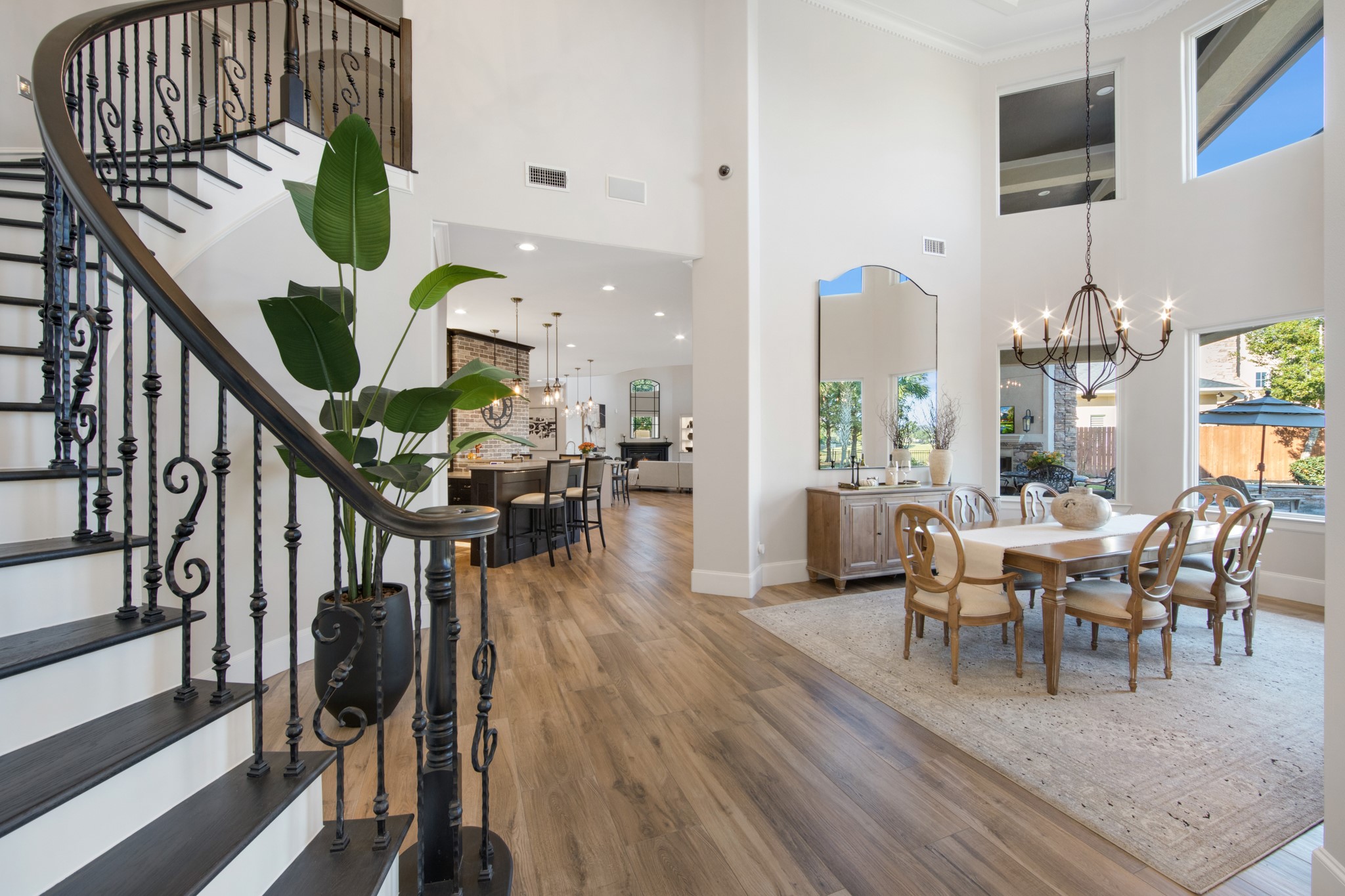 15702 Knauff Ranch Court Cypress, TX 77429 - Photo 9 of 50 a dining room with furniture entryway and wooden floor