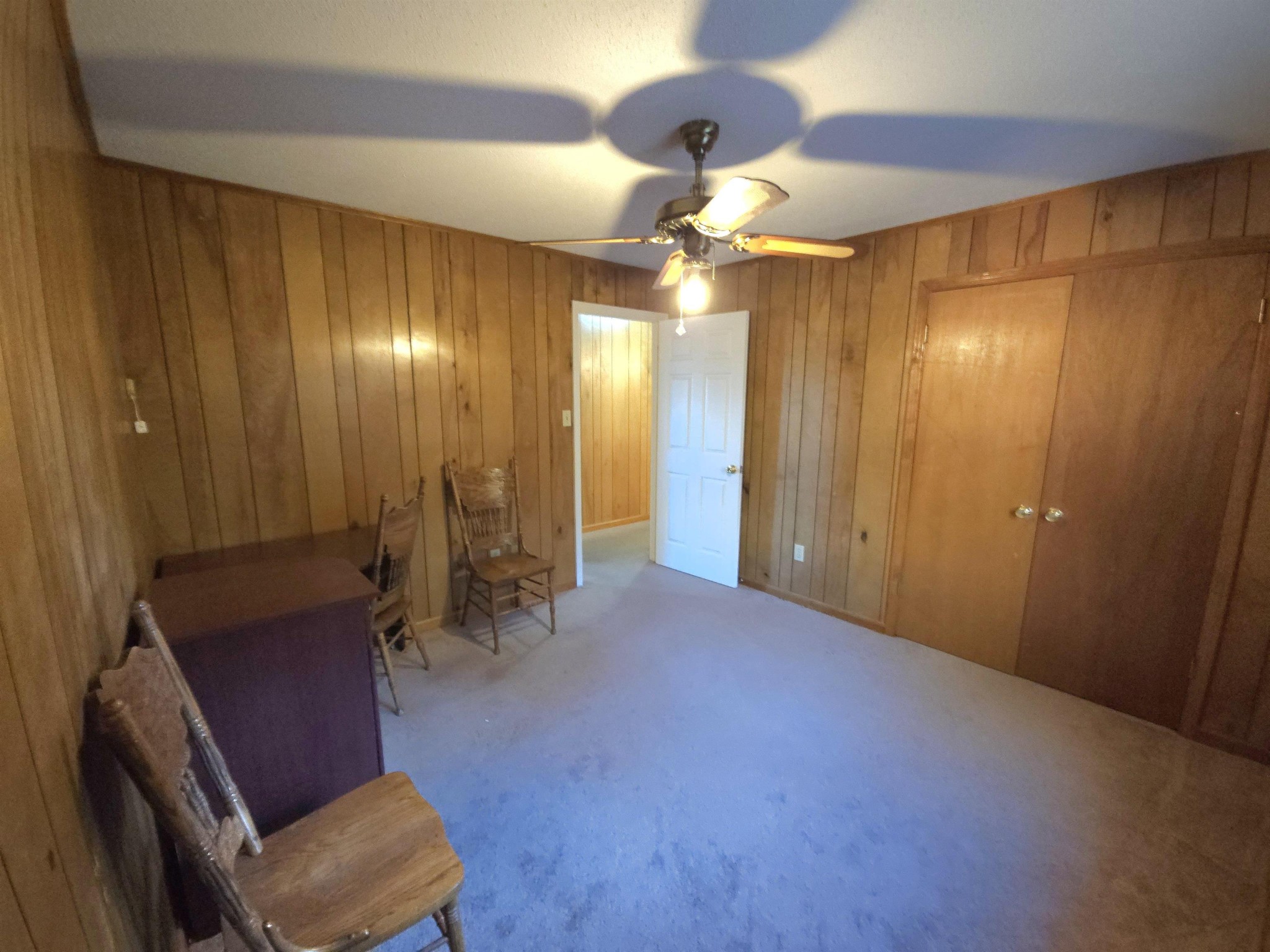 1728 Oil Mill Road Covington, TN 38019 - Photo 12 of 25 a view of a livingroom with a furniture and chandelier fan