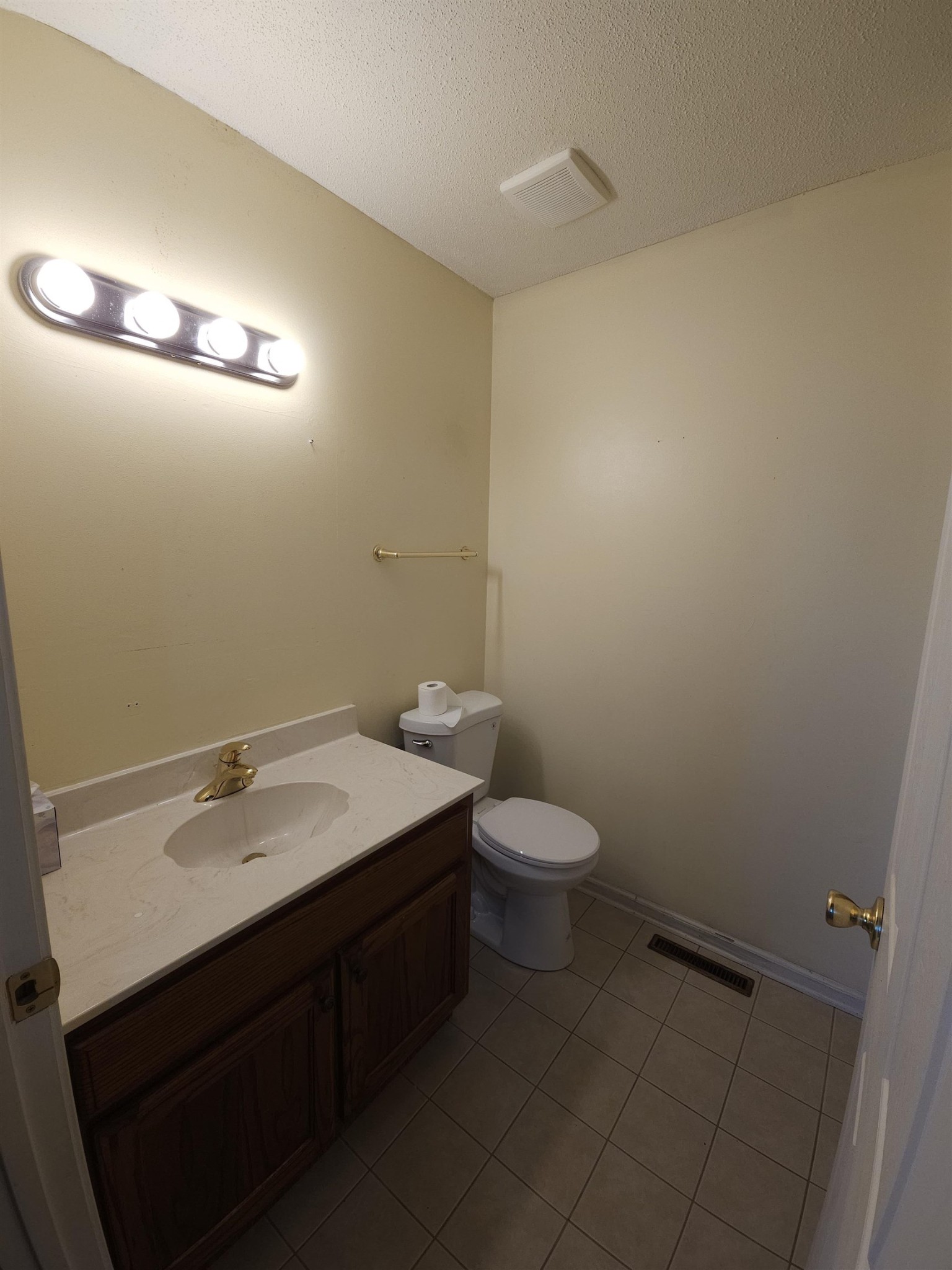 1728 Oil Mill Road Covington, TN 38019 - Photo 13 of 25 a bathroom with a sink and a mirror