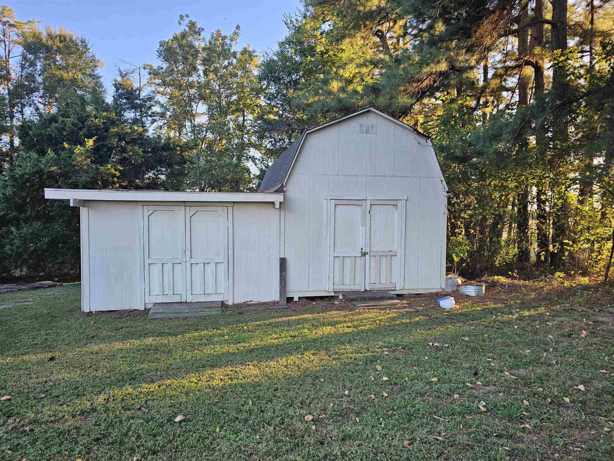 1728 Oil Mill Road Covington, TN 38019 - Photo 20 of 25 a backyard of a house with lots of green space