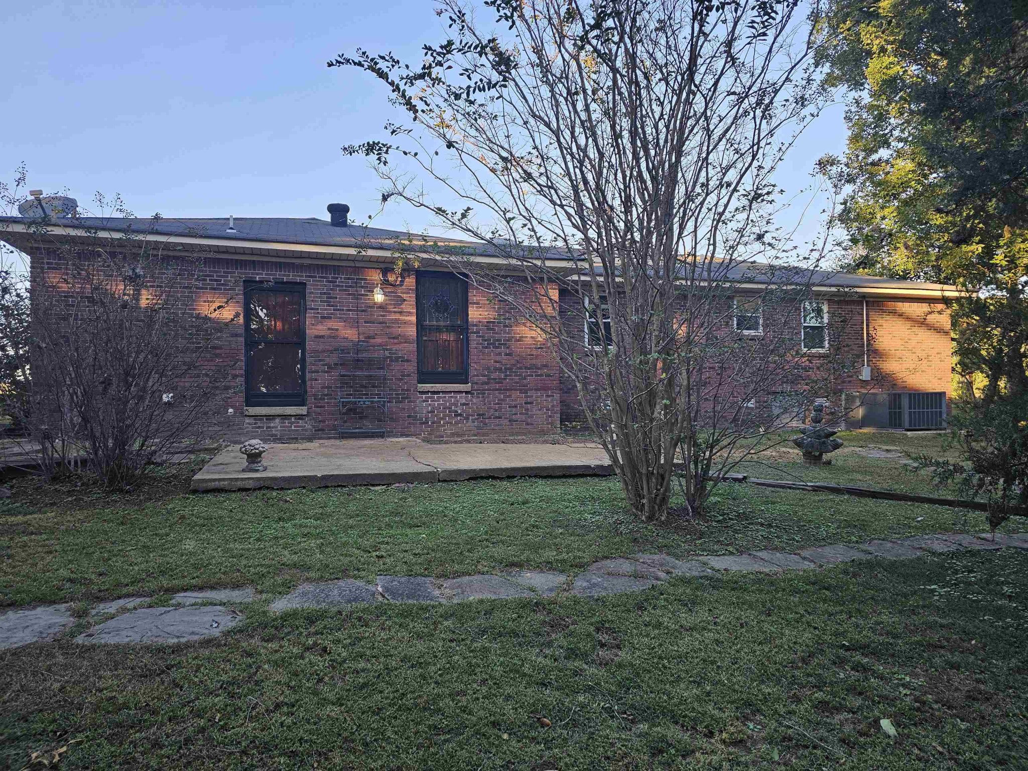1728 Oil Mill Road Covington, TN 38019 - Photo 24 of 25 a view of a backyard with large trees