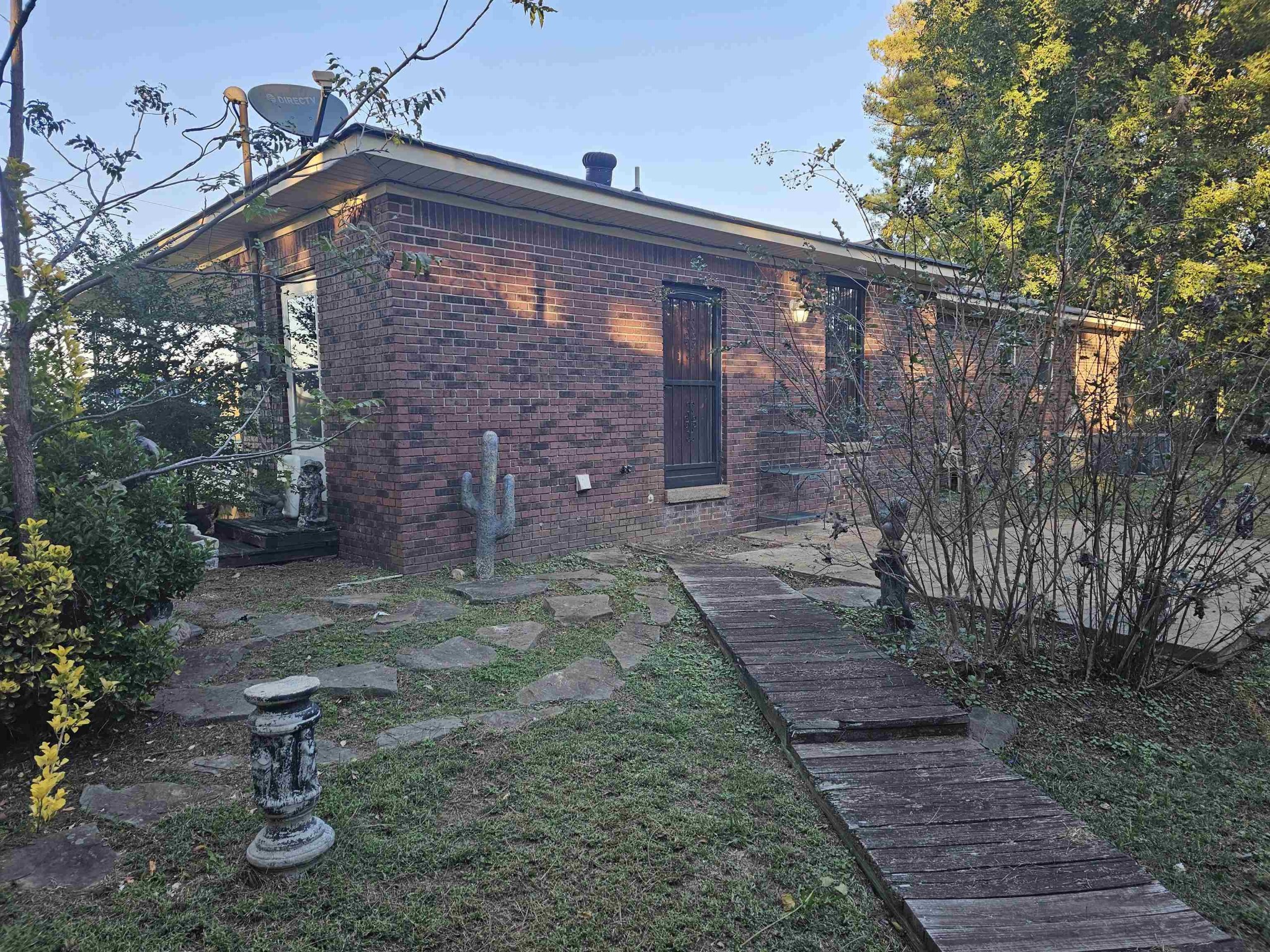 1728 Oil Mill Road Covington, TN 38019 - Photo 25 of 25 a backyard of a house with lots of green space