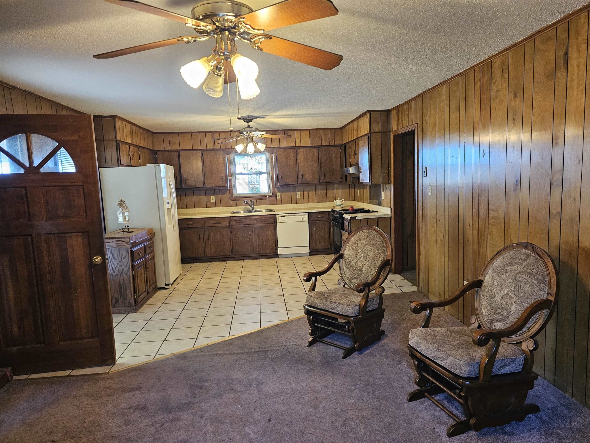 1728 Oil Mill Road Covington, TN 38019 - Photo 4 of 25 a room with patio furniture and kitchen view