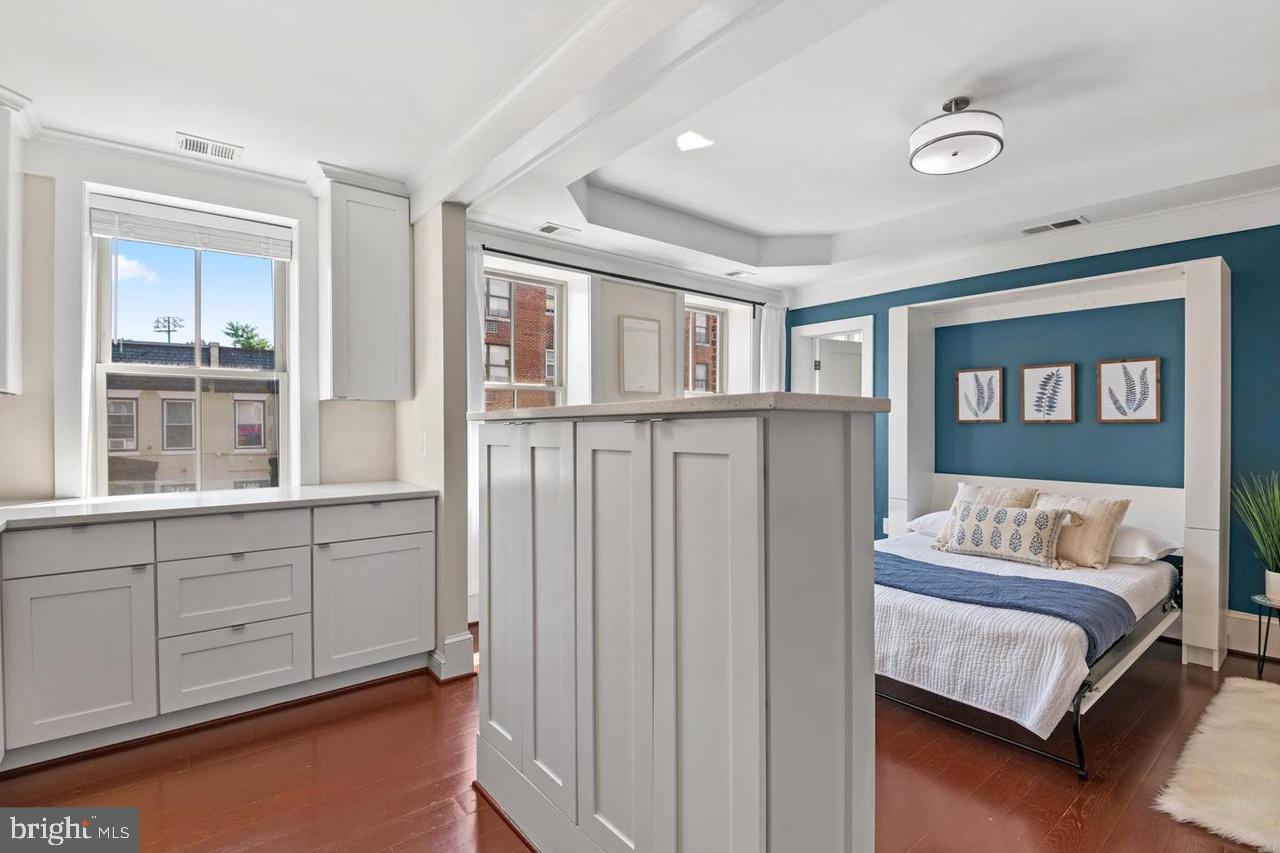 1451 Park Road Northwest, Unit 220 Washington, DC 20010 - Photo 15 of 30 a bedroom with furniture and window
