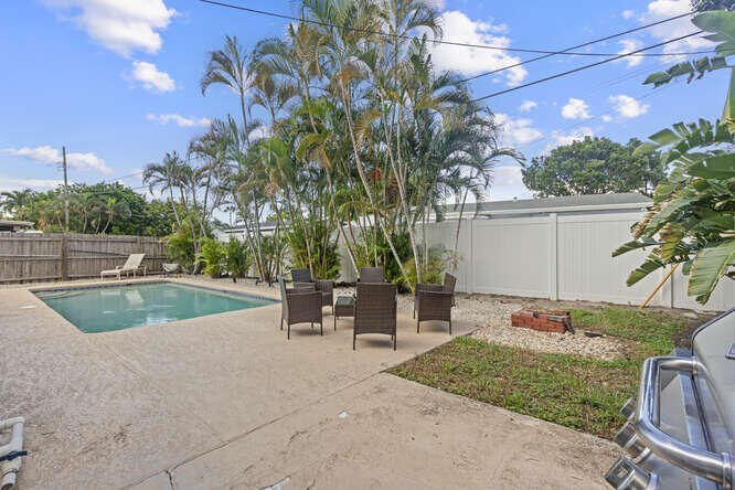 2630 Northeast 10th Avenue Pompano Beach, FL 33064 - Photo 2 of 12 a view of outdoor space yard and patio