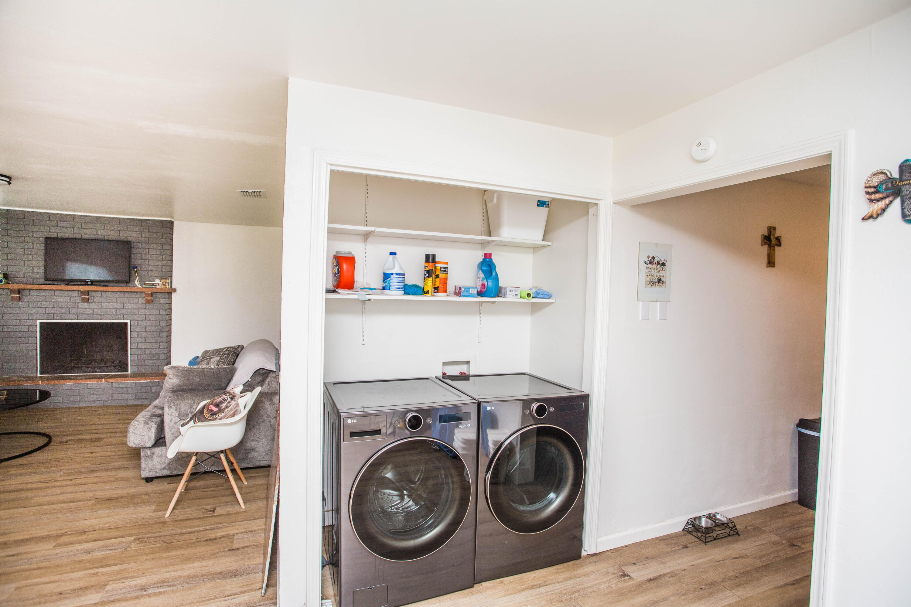 2604 39th Street Lubbock, TX 79413 - Photo 11 of 43 a view of livingroom with washer and dryer