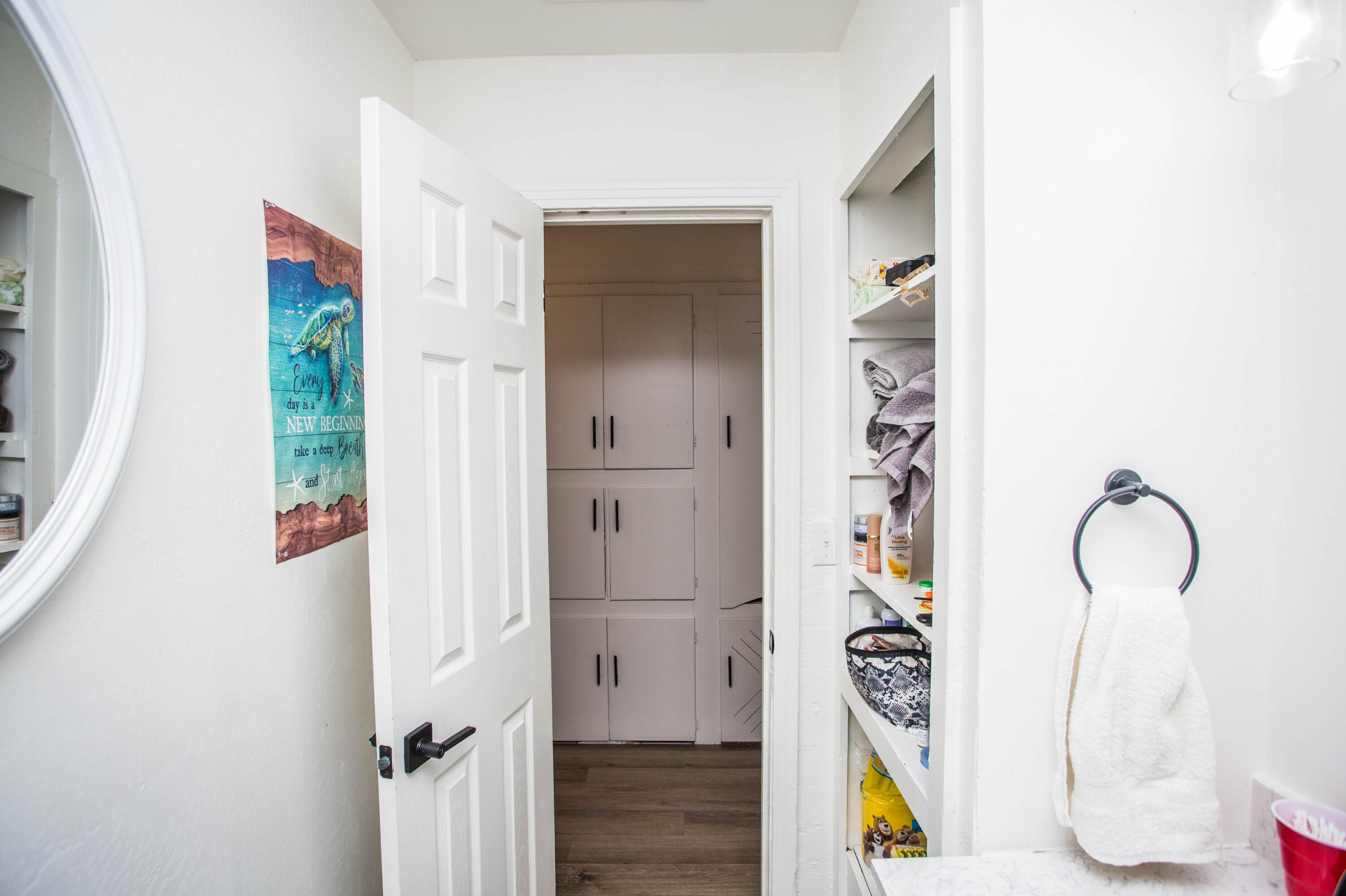 2604 39th Street Lubbock, TX 79413 - Photo 19 of 43 a view of an entryway with wooden floor