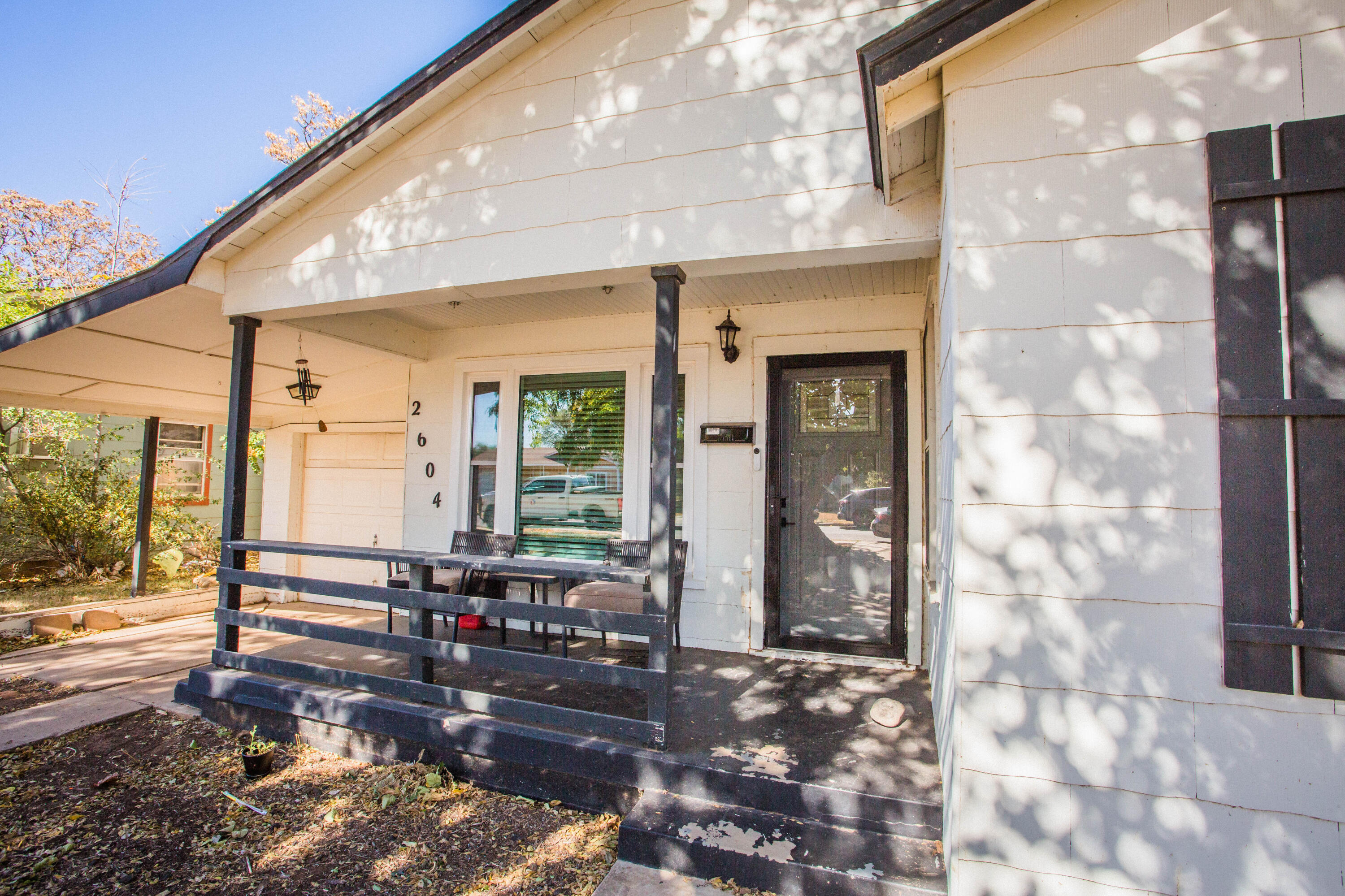 2604 39th Street Lubbock, TX 79413 - Photo 2 of 43 a living room filled with furniture