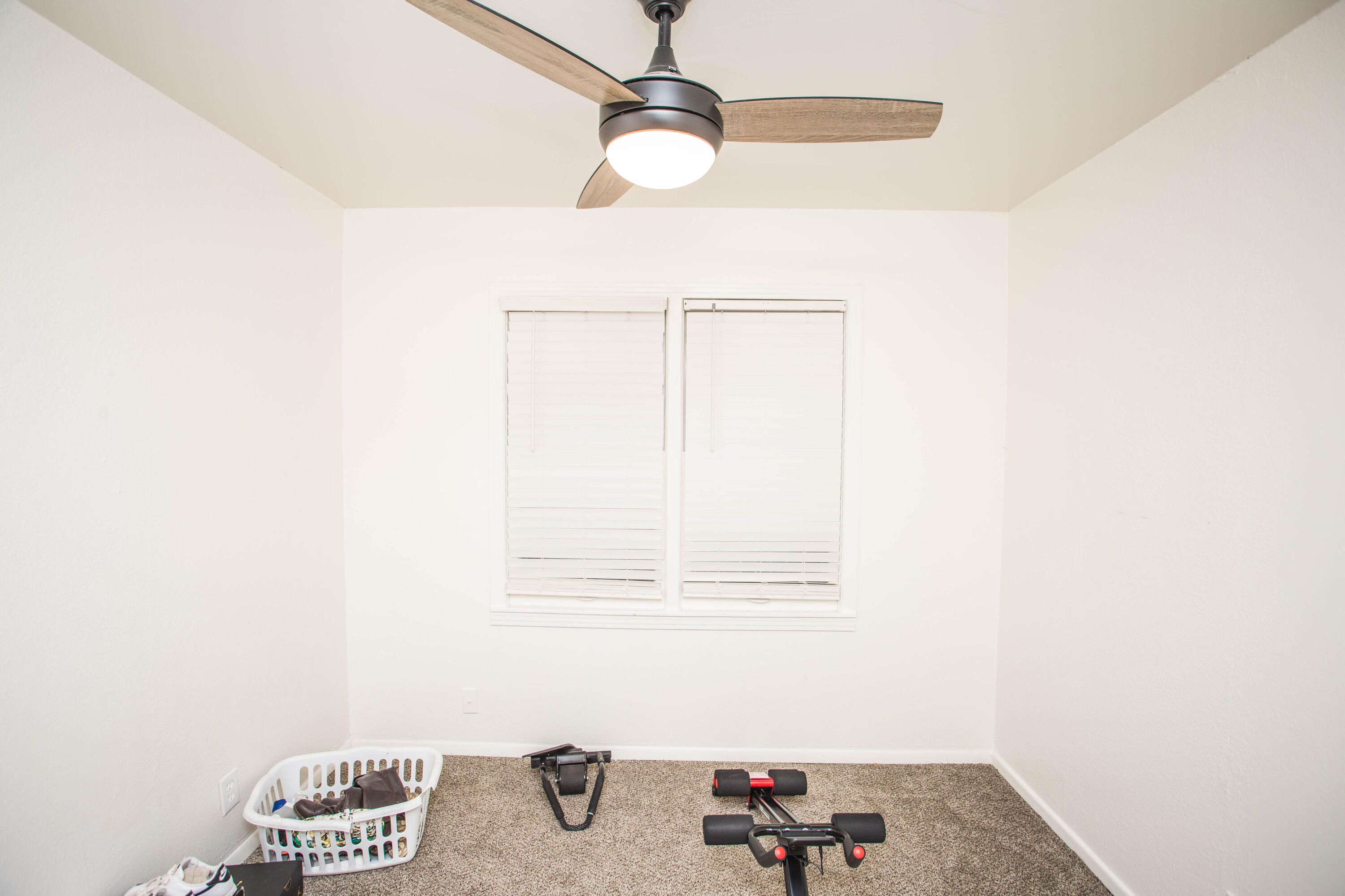 2604 39th Street Lubbock, TX 79413 - Photo 23 of 43 a view of a workspace with a window