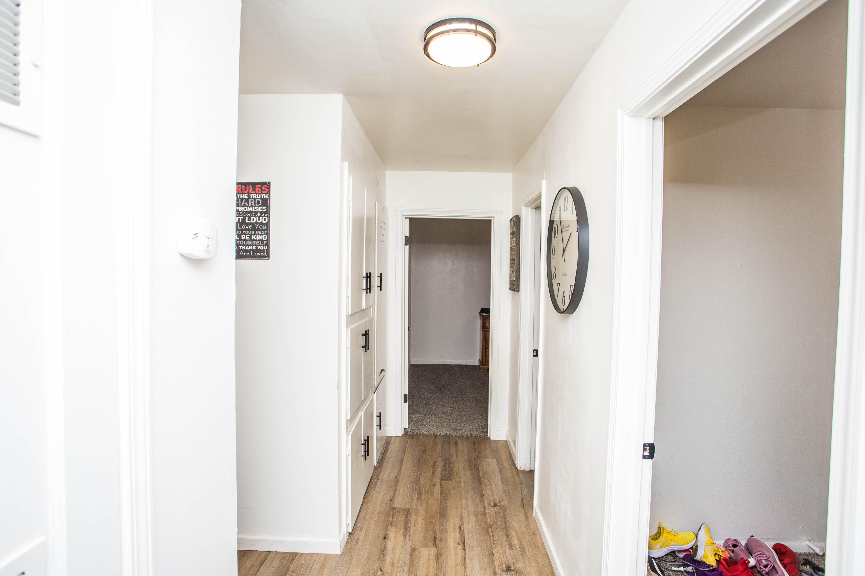 2604 39th Street Lubbock, TX 79413 - Photo 25 of 43 a view of a bathroom with a sink and mirror