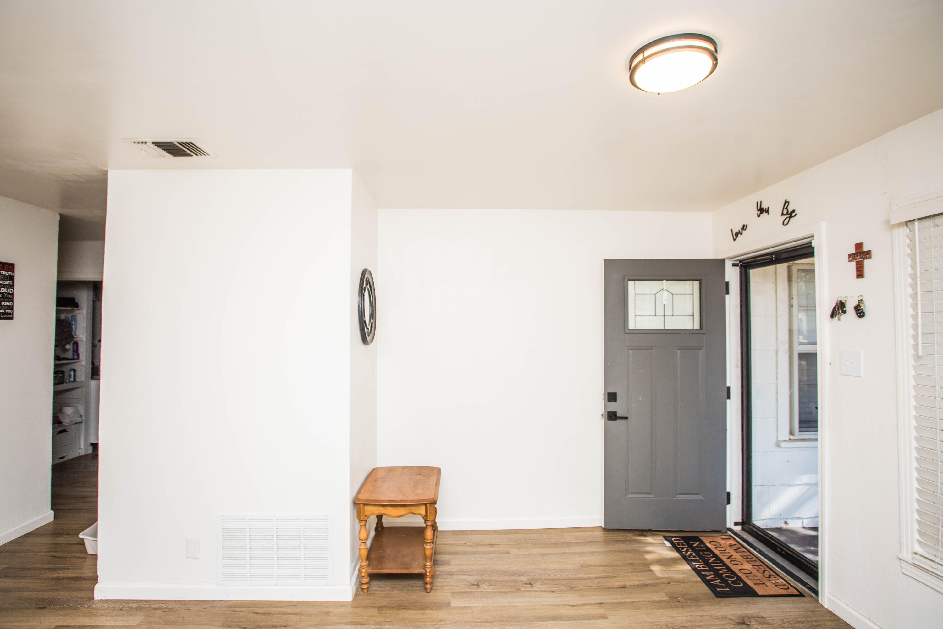 2604 39th Street Lubbock, TX 79413 - Photo 32 of 43 a view of room with furniture and wooden floor