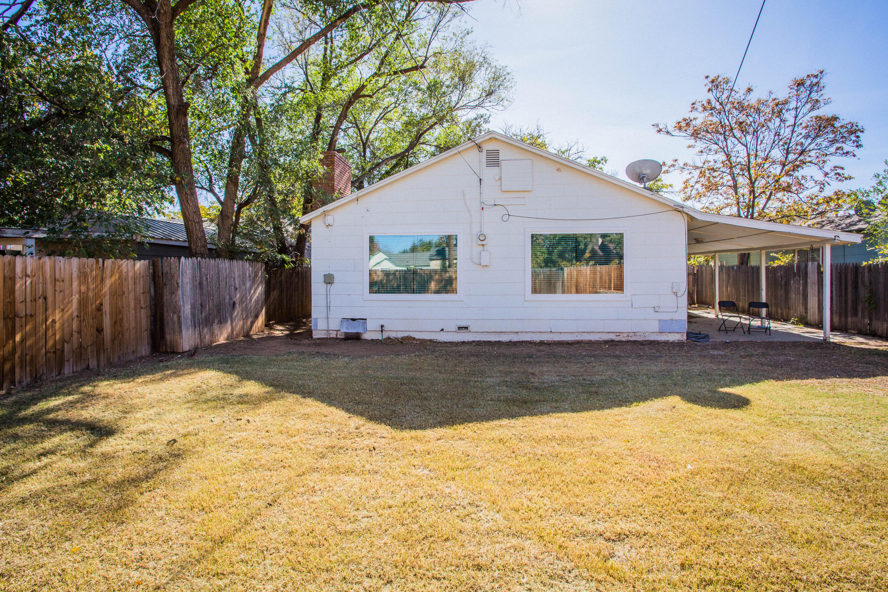 2604 39th Street Lubbock, TX 79413 - Photo 34 of 43 a view of a house with snow on the wall