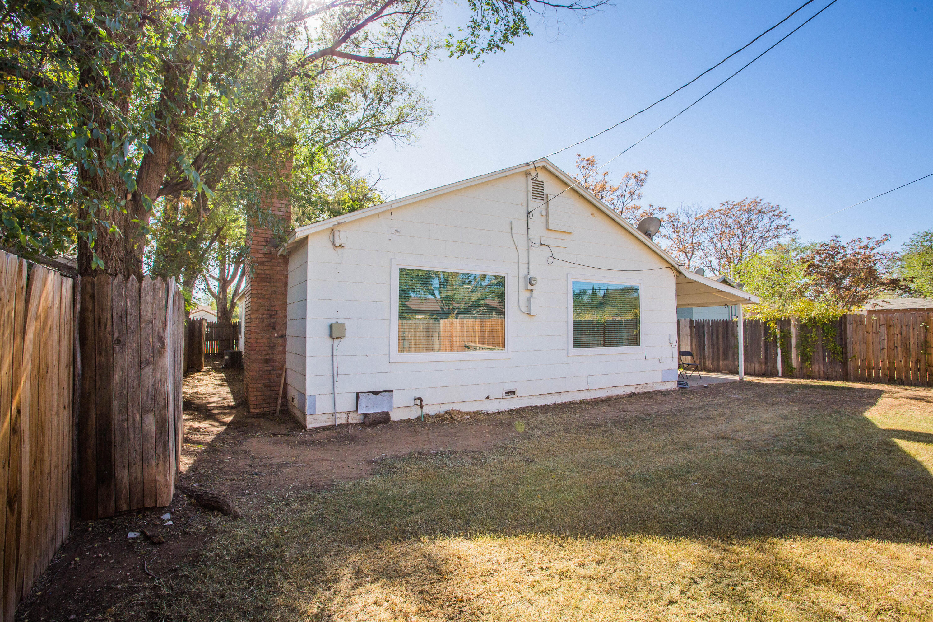 2604 39th Street Lubbock, TX 79413 - Photo 35 of 43 a view of a house with a yard