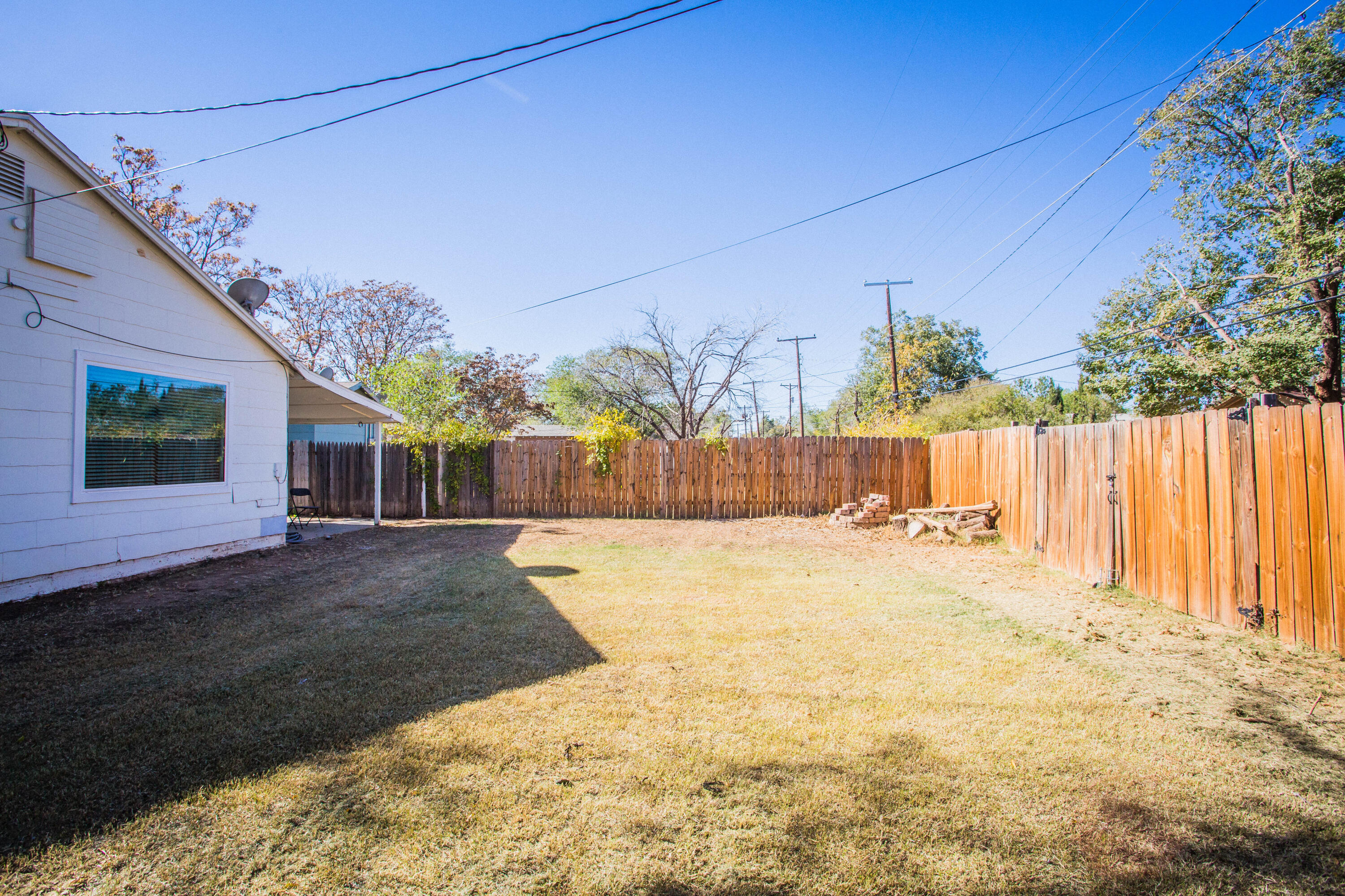 2604 39th Street Lubbock, TX 79413 - Photo 36 of 43 a view of a backyard of the house