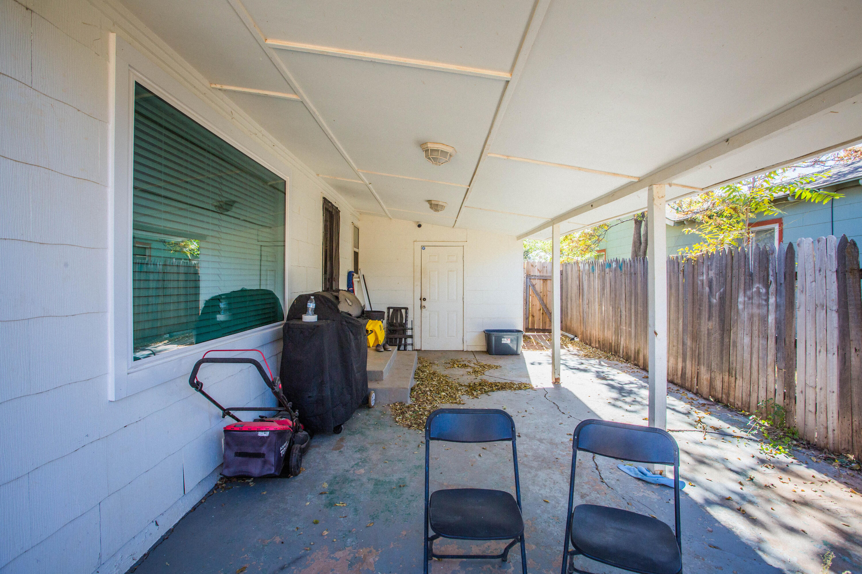 2604 39th Street Lubbock, TX 79413 - Photo 38 of 43 a view of a porch with furniture and wooden floor