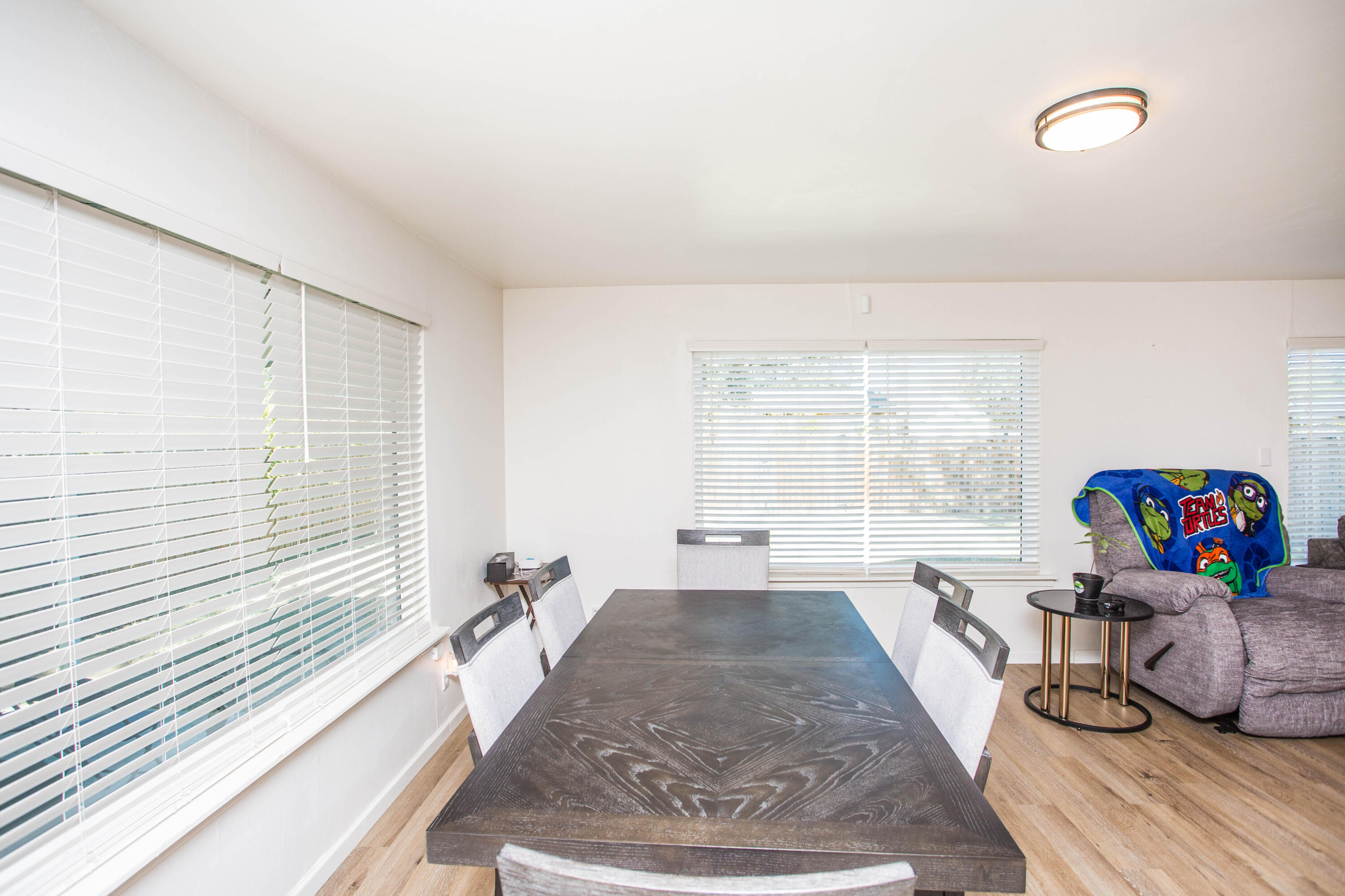 2604 39th Street Lubbock, TX 79413 - Photo 4 of 43 a living room with furniture and a large window