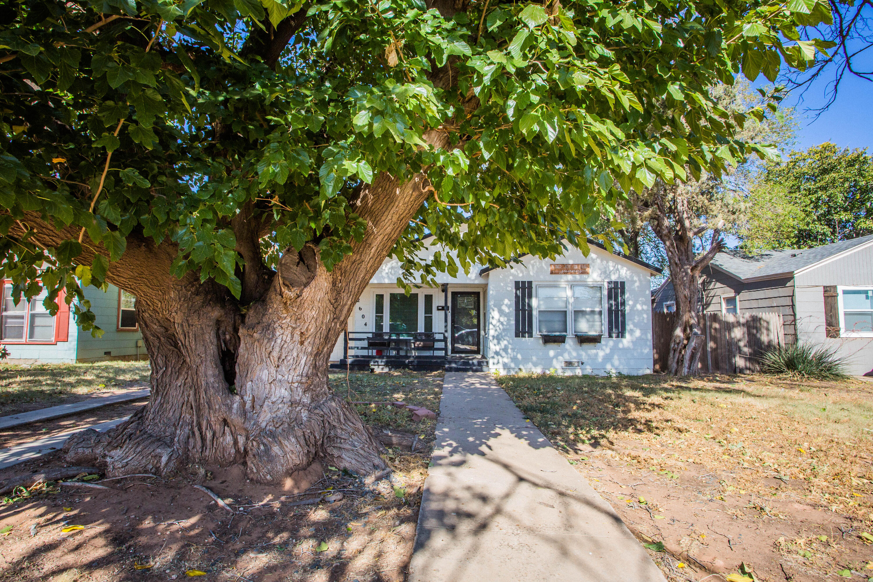 2604 39th Street Lubbock, TX 79413 - Photo 41 of 43 a view of a house with a tree in the background