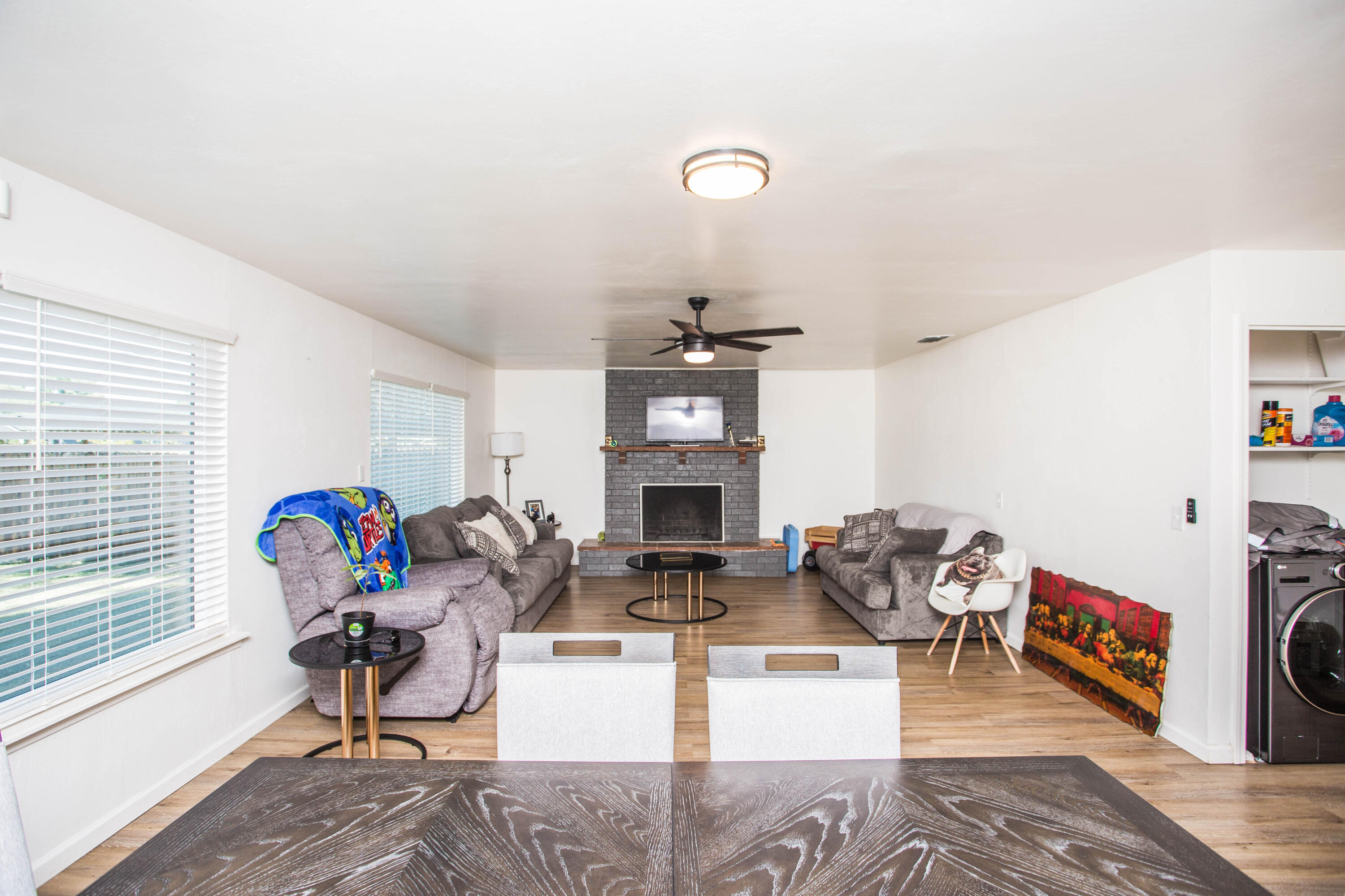 2604 39th Street Lubbock, TX 79413 - Photo 5 of 43 a living room with fireplace furniture and a window