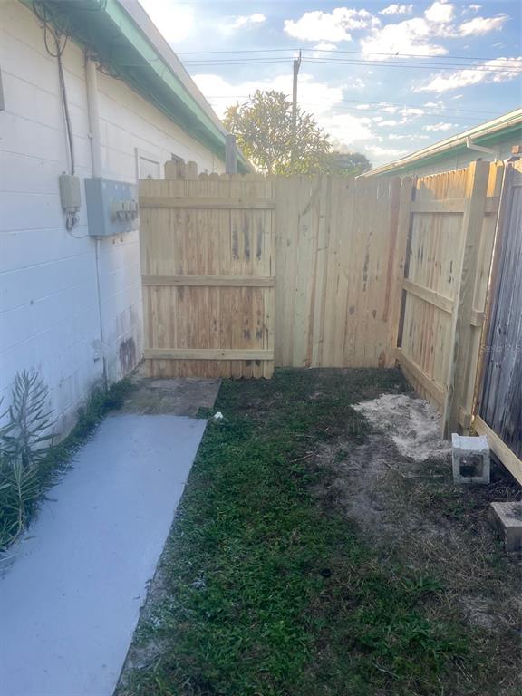 461 South Brevard Avenue, Unit 18 Cocoa Beach, FL 32931 - Photo 24 of 24 a view of backyard with tub