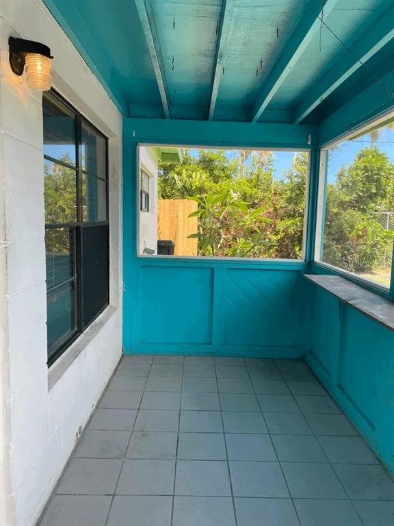 461 South Brevard Avenue, Unit 18 Cocoa Beach, FL 32931 - Photo 3 of 24 a view of an empty room with a window