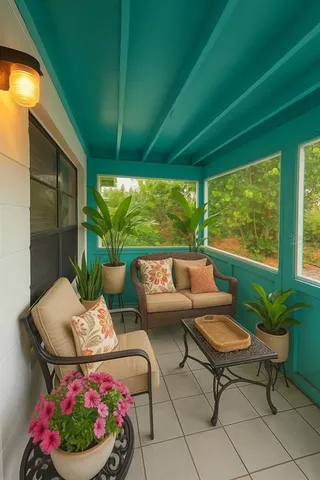 a outdoor living space with furniture and garden view